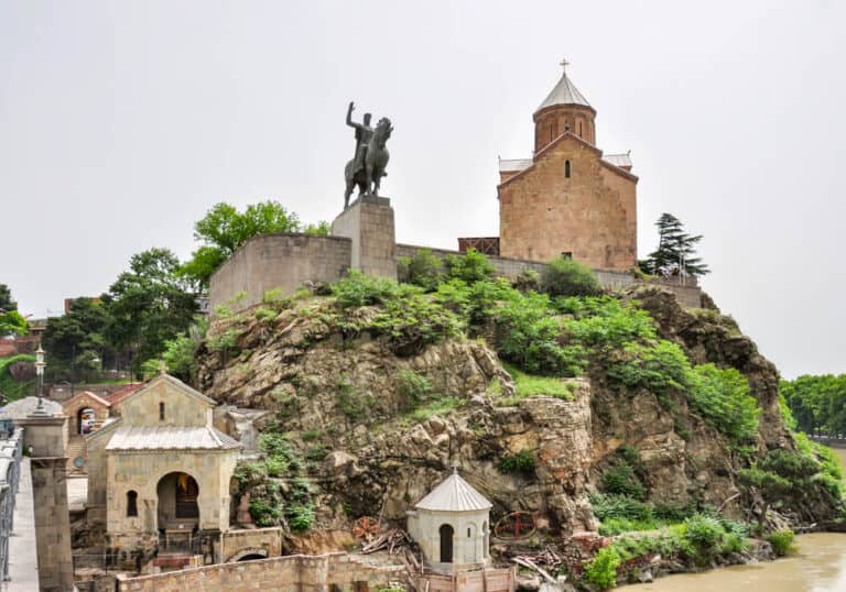 Ancient Metekhi church and Vakhtang Gorgasali monument in Tbilisi, Georgia